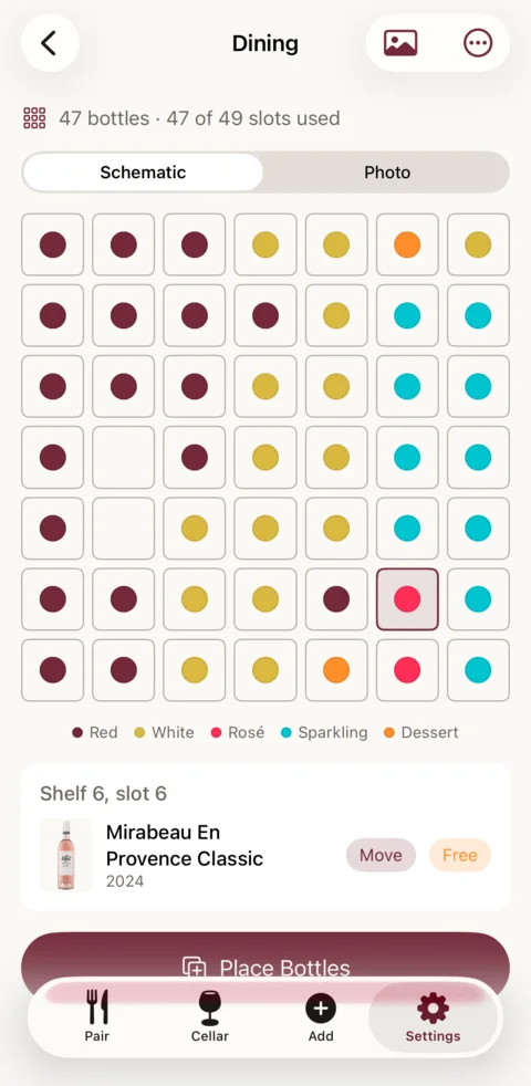 A wine rack mapped as a grid, each bottle a dot coloured by type, with one slot selected to show the Provence rosé in it